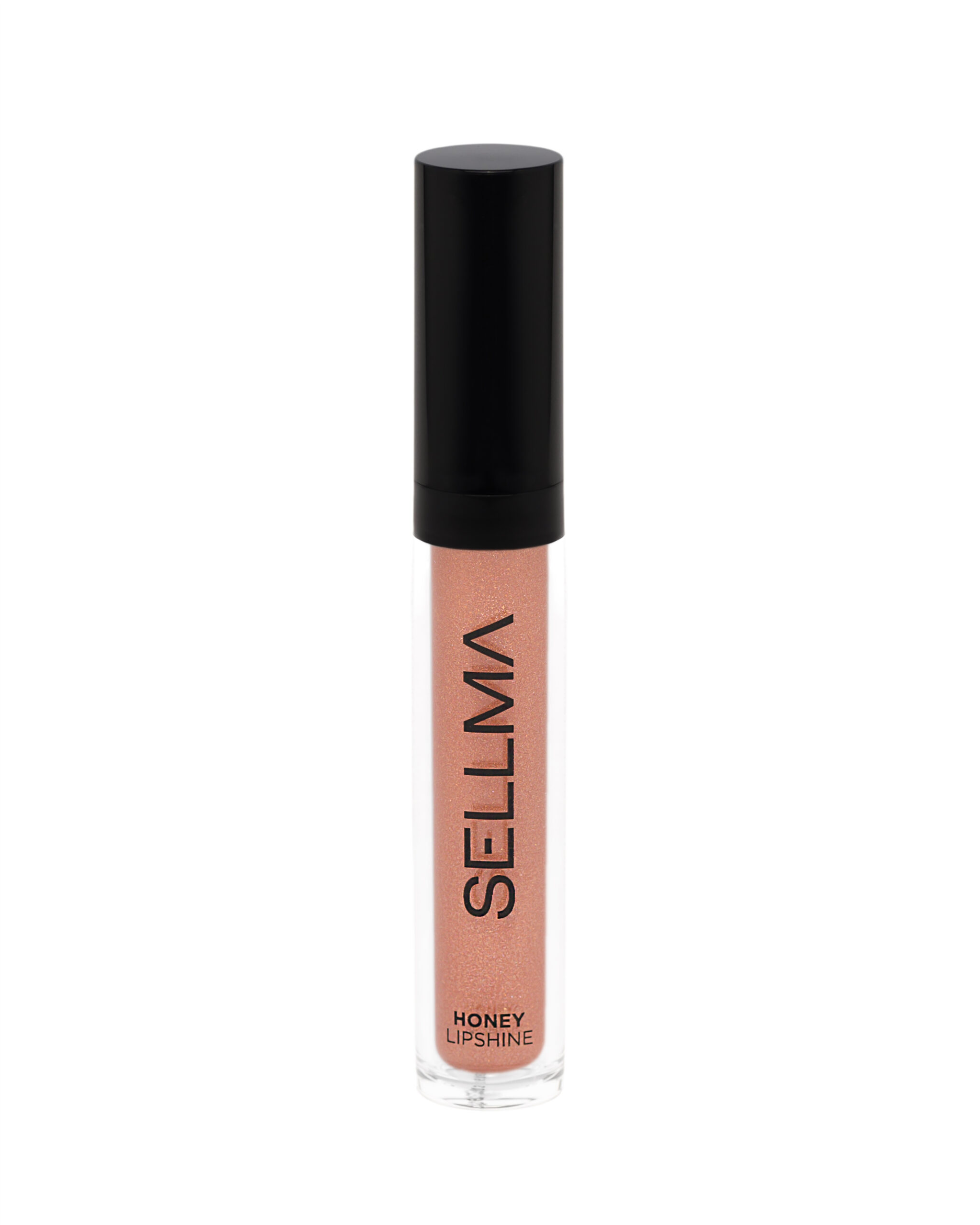 Lip gloss tube with a black cap, peachy-pink shimmer, labeled 'HONEY LIP SHINE' on the bottle