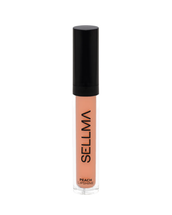 Close-up of a peach-colored lip gloss in a clear cylindrical tube with a glossy black cap, label reads 'PEACH LIPSHINE' at the bottom.