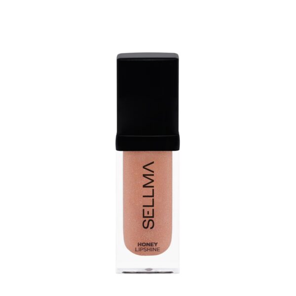 Lip gloss in a clear tube with a black cap, peach shimmer shade labeled Honey Lipshine.